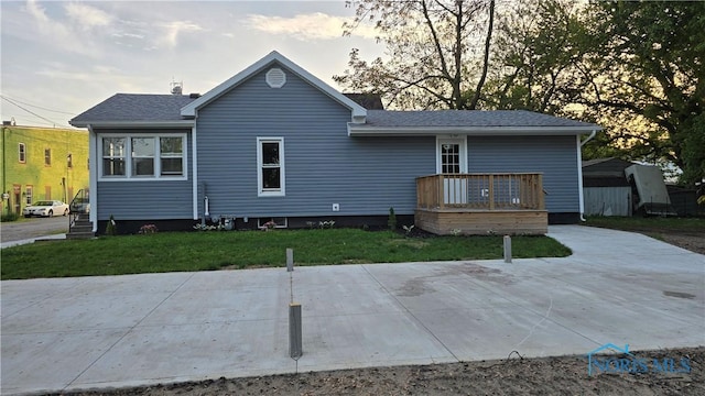 103 E N St, Liberty Center, OH 43532 - back of house with a yard and a deck