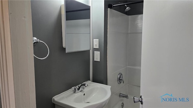 103 E N St, Liberty Center, OH 43532 - full bath featuring a sink and bathing tub / shower combination