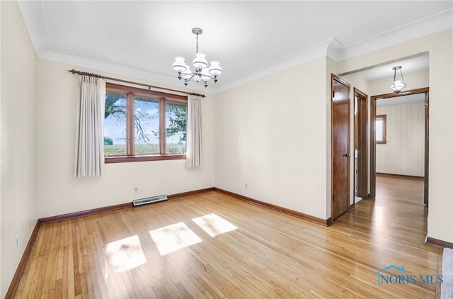 403 S N Curtice Rd, Oregon, OH 43616 - empty room with a chandelier, light wood finished floors, baseboards, and crown molding