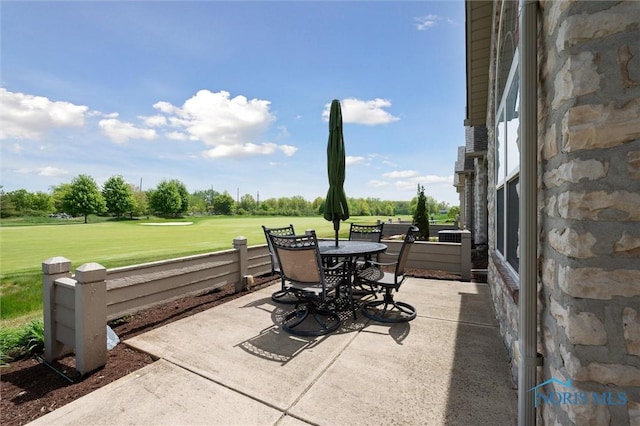 2730 Canterbury Cir Unit 23B, Port Clinton, OH 43452 - view of patio / terrace featuring outdoor dining area and golf course view