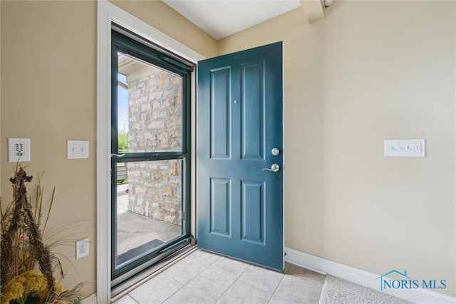 2730 Canterbury Cir Unit 23B, Port Clinton, OH 43452 - foyer entrance featuring light tile patterned floors and baseboards