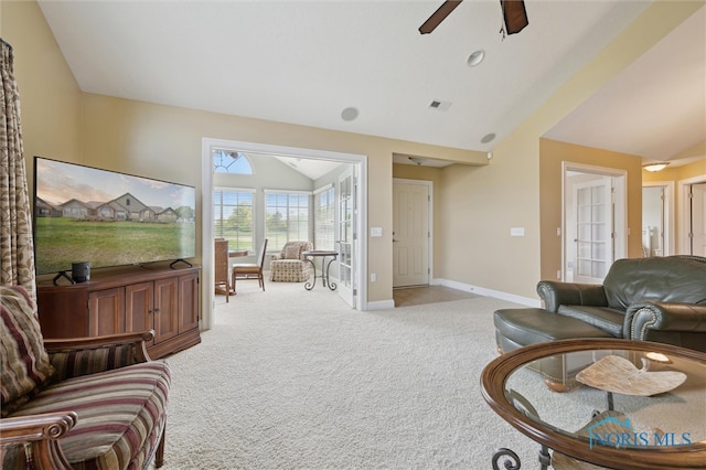 2730 Canterbury Cir Unit 23B, Port Clinton, OH 43452 - living room with lofted ceiling, light colored carpet, baseboards, and ceiling fan