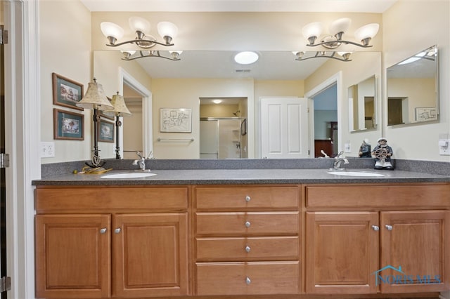2730 Canterbury Cir Unit 23B, Port Clinton, OH 43452 - full bath featuring a chandelier, a shower stall, and double vanity