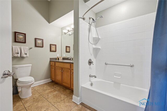 2730 Canterbury Cir Unit 23B, Port Clinton, OH 43452 - full bathroom with shower / tub combo, toilet, tile patterned floors, vanity, and baseboards