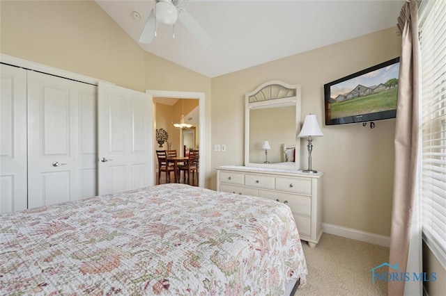 2730 Canterbury Cir Unit 23B, Port Clinton, OH 43452 - bedroom with lofted ceiling, light colored carpet, baseboards, ceiling fan, and a closet