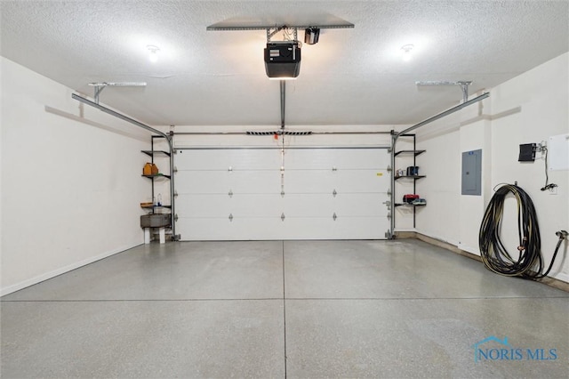 2730 Canterbury Cir Unit 23B, Port Clinton, OH 43452 - garage with electric panel, a garage door opener, and baseboards