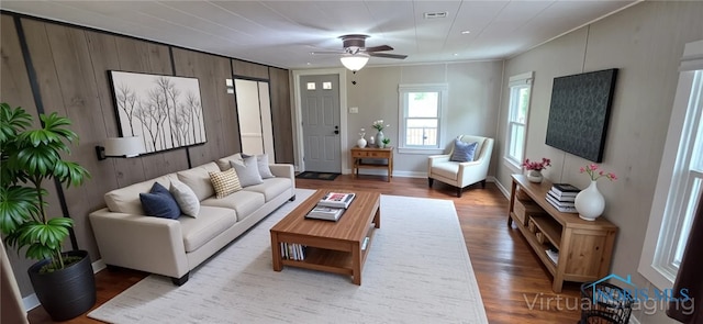 1037 Fishlock Ave, Findlay, OH 45840 - living area with wood finished floors, ceiling fan, wooden walls, and recessed lighting