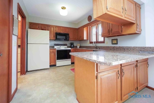 2023 Bluestone Dr, Findlay, OH 45840 - kitchen featuring white appliances, a peninsula, light floors, a sink, and light stone counters