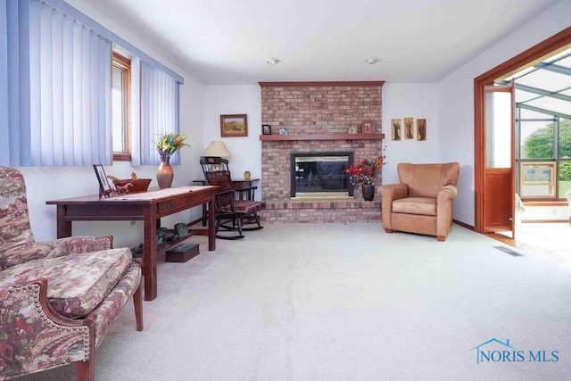 2023 Bluestone Dr, Findlay, OH 45840 - living area featuring carpet and a fireplace