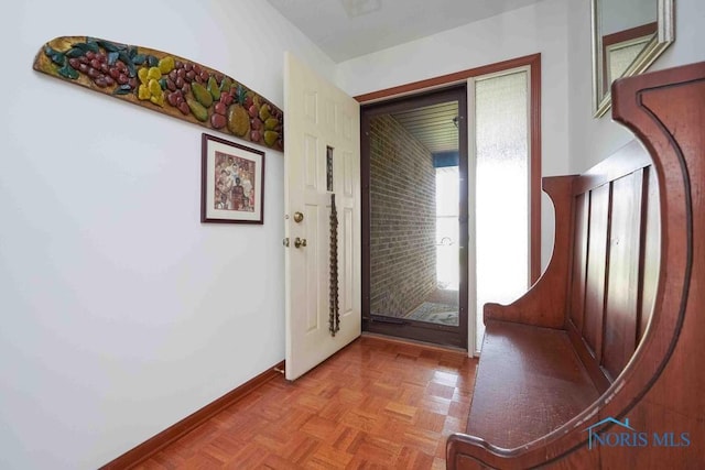 2023 Bluestone Dr, Findlay, OH 45840 - foyer entrance with brick wall and baseboards
