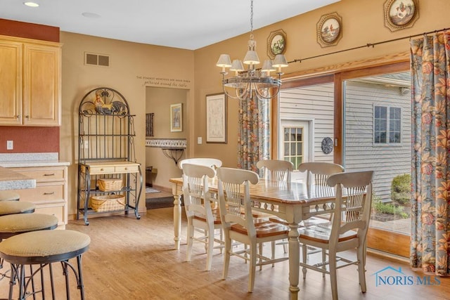 14360 County Road 2, Swanton, OH 43558 - dining area featuring light wood finished floors, a chandelier, and recessed lighting