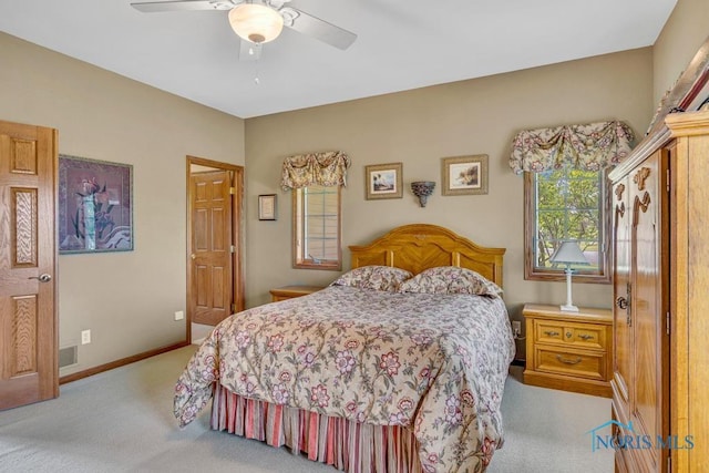 14360 County Road 2, Swanton, OH 43558 - bedroom with carpet flooring, baseboards, and a ceiling fan