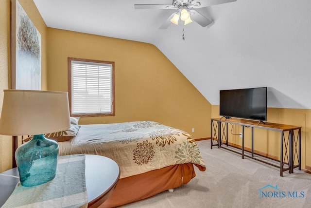 14360 County Road 2, Swanton, OH 43558 - carpeted bedroom featuring vaulted ceiling, a ceiling fan, and baseboards
