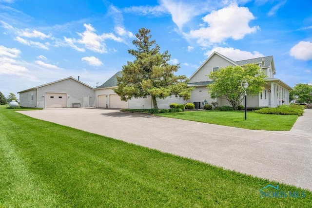 14360 County Road 2, Swanton, OH 43558 - view of front of property with a front yard and concrete driveway