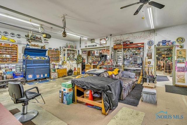 14360 County Road 2, Swanton, OH 43558 - garage featuring a workshop area and a ceiling fan