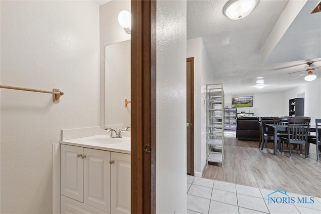 2540 Plum Leaf Ln, Toledo, OH 43614 - bathroom with tile patterned floors, a ceiling fan, vanity, and baseboards