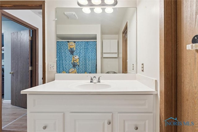 2540 Plum Leaf Ln, Toledo, OH 43614 - full bath with vanity and wood finished floors