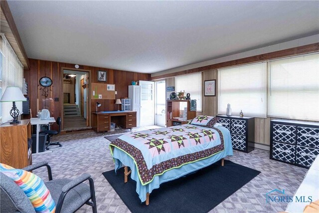 344 E Findlay St, Sugar Creek Township, OH 45893 - carpeted bedroom featuring wooden walls