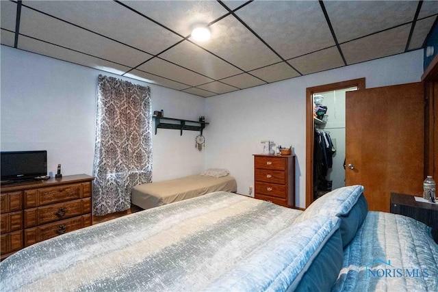 344 E Findlay St, Sugar Creek Township, OH 45893 - bedroom featuring a drop ceiling, a walk in closet, and a closet