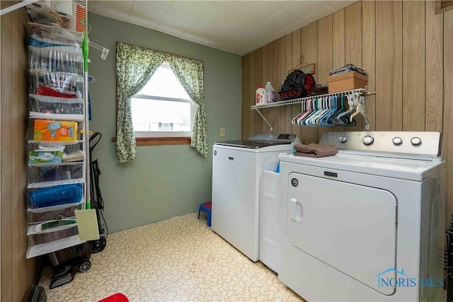 344 E Findlay St, Sugar Creek Township, OH 45893 - laundry room with independent washer and dryer and wooden walls