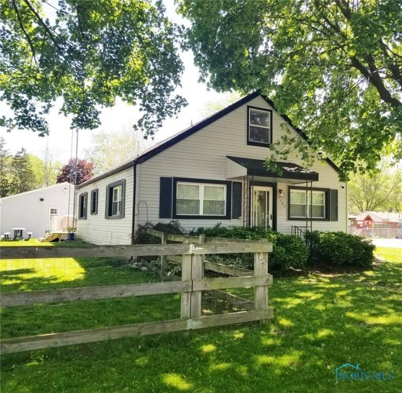 view of front of property with central AC