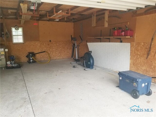 5502 Rudyard Rd, Sylvania, OH 43560 - garage featuring a garage door opener