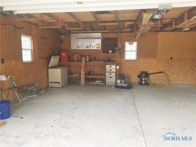 5502 Rudyard Rd, Sylvania, OH 43560 - garage featuring a garage door opener