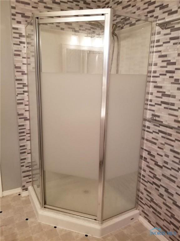 5502 Rudyard Rd, Sylvania, OH 43560 - bathroom featuring a stall shower