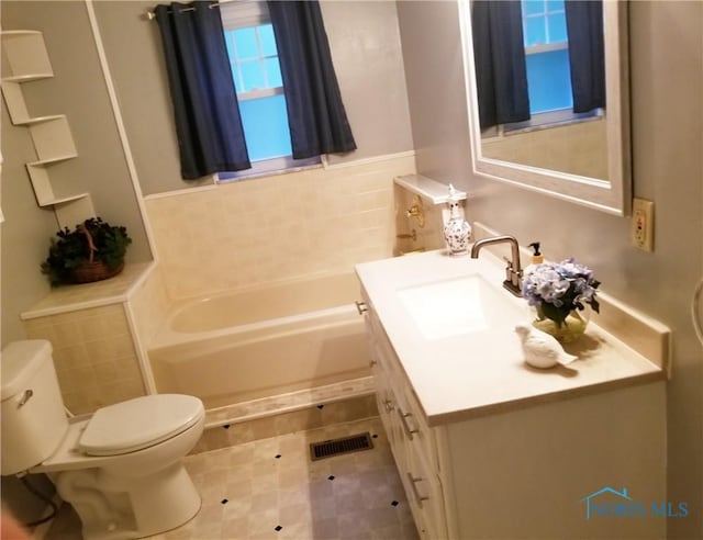 5502 Rudyard Rd, Sylvania, OH 43560 - full bathroom featuring toilet, vanity, and a garden tub