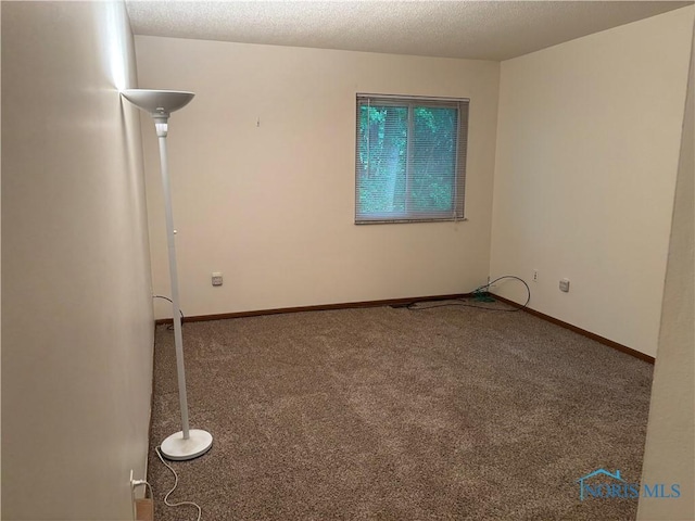6955 Dorr St Unit 56, Toledo, OH 43615 - empty room featuring carpet flooring and baseboards