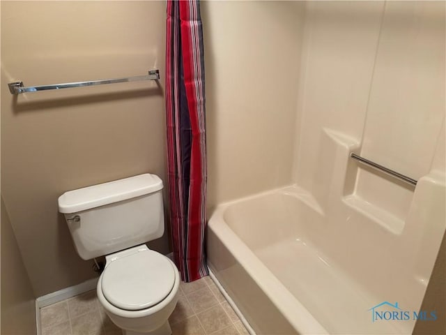 6955 Dorr St Unit 56, Toledo, OH 43615 - full bathroom featuring toilet, tile patterned floors, and baseboards