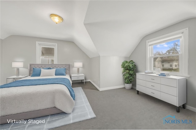 259 W Elm St, Wauseon, OH 43567 - carpeted bedroom featuring lofted ceiling and baseboards
