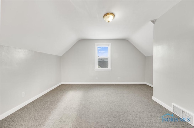 259 W Elm St, Wauseon, OH 43567 - additional living space featuring carpet, vaulted ceiling, and baseboards