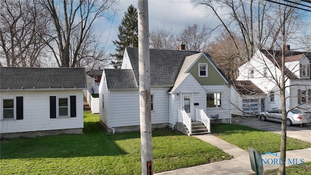 259 W Elm St, Wauseon, OH 43567 - view of front of property with a front yard