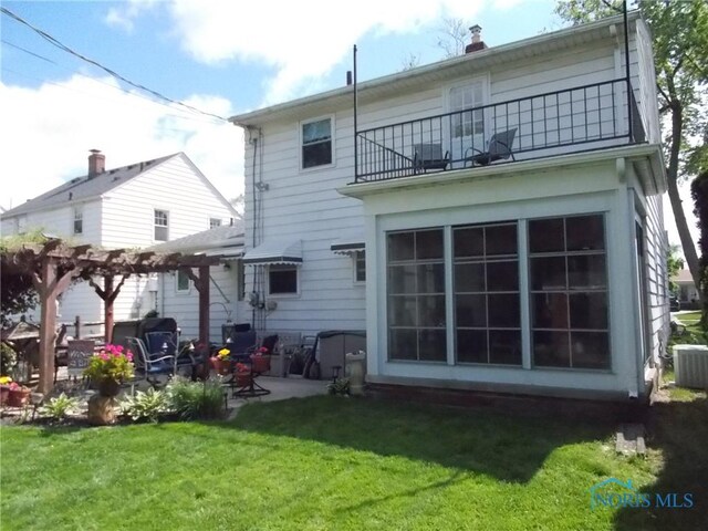 3440 Mapleway Dr, Toledo, OH 43614 - back of house with a balcony, a pergola, central air condition unit, a yard, and a patio