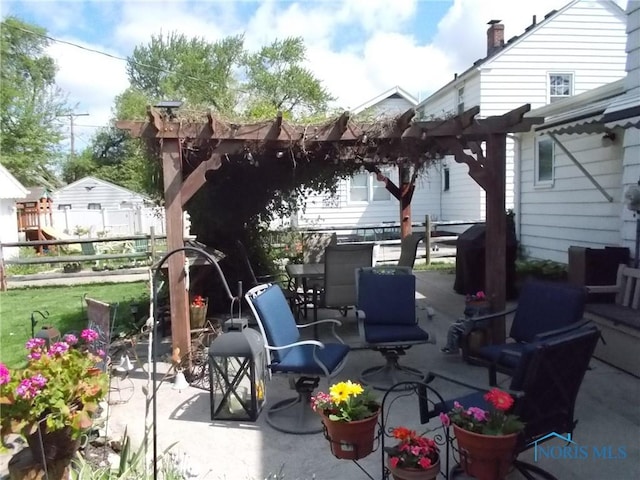 3440 Mapleway Dr, Toledo, OH 43614 - view of patio featuring fence and a pergola