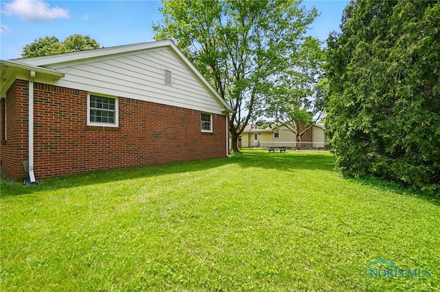 1110 Bourgogne Ave, Bowling Green, OH 43402 - view of side of property with brick siding