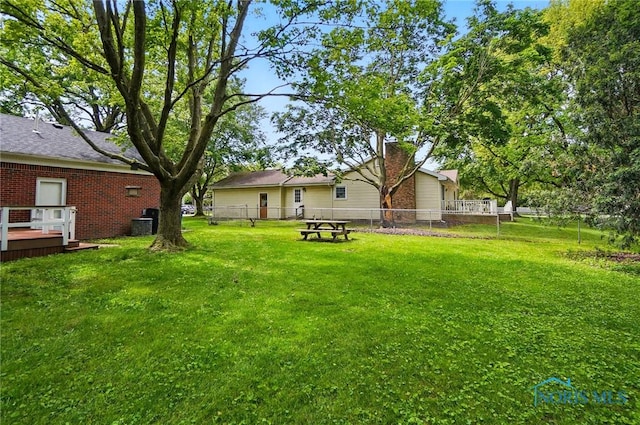 1110 Bourgogne Ave, Bowling Green, OH 43402 - view of yard with a deck