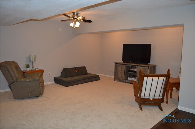 1243 1st St, Findlay, OH 45840 - carpeted living room featuring a ceiling fan, baseboards, and vaulted ceiling