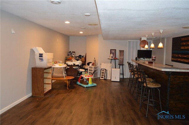 1243 1st St, Findlay, OH 45840 - indoor dry bar featuring wood finished floors, recessed lighting, and baseboards