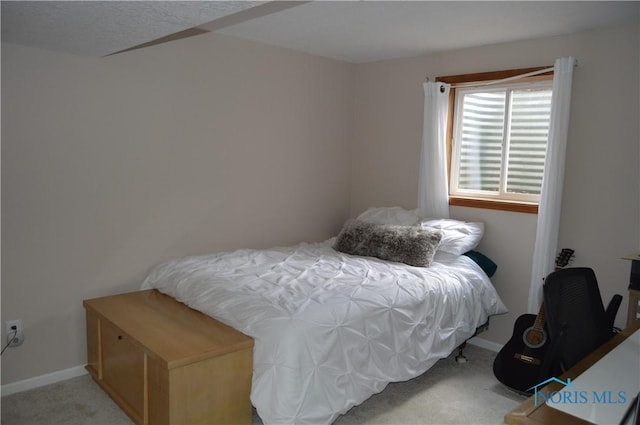 1243 1st St, Findlay, OH 45840 - carpeted bedroom featuring baseboards