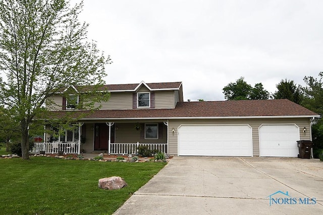 100 E End Dr, Pioneer, OH 43554 - view of front of house featuring driveway, an attached garage, covered porch, a front yard, and a shingled roof