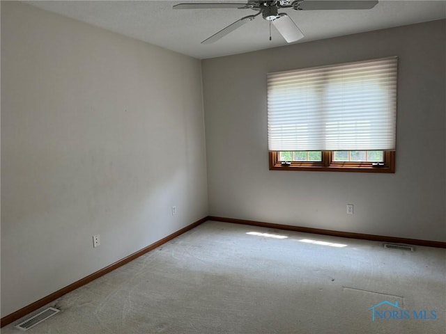 8411 Willow Glen Ct, Holland, OH 43528 - carpeted spare room with ceiling fan and baseboards
