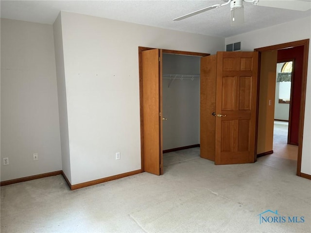8411 Willow Glen Ct, Holland, OH 43528 - unfurnished bedroom with carpet, a closet, and a ceiling fan