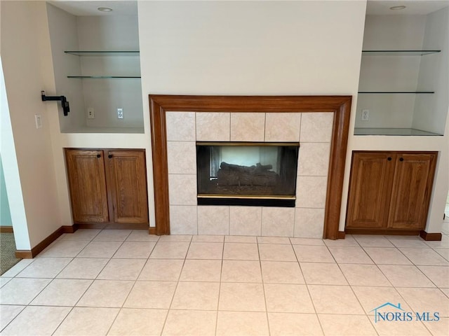 8411 Willow Glen Ct, Holland, OH 43528 - detailed view of built in features and a tiled fireplace