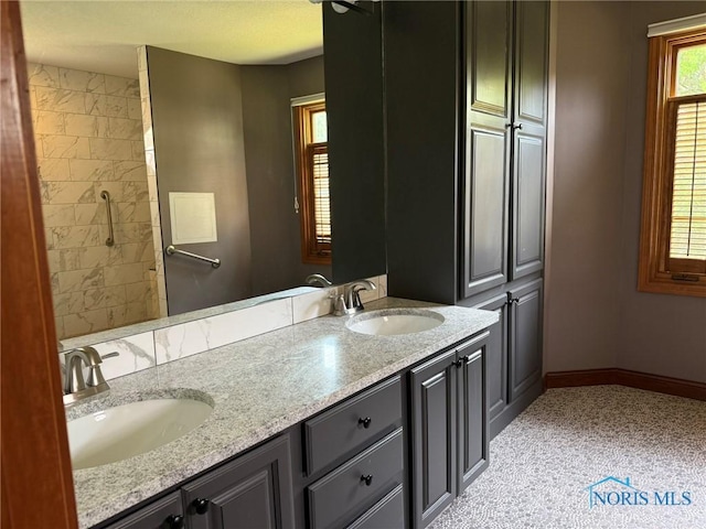 8411 Willow Glen Ct, Holland, OH 43528 - full bath featuring double vanity and a tile shower