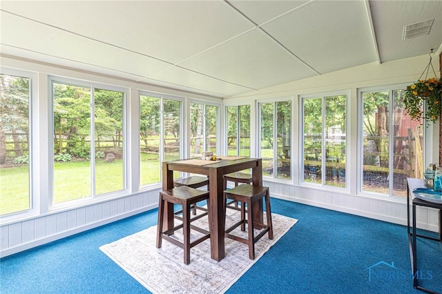 4911 Claradale Rd, Toledo, OH 43614 - sunroom featuring carpet flooring, healthy amount of natural light, and lofted ceiling