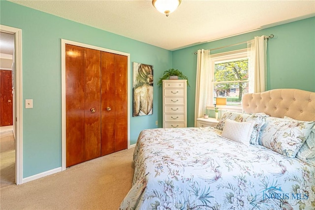 4911 Claradale Rd, Toledo, OH 43614 - carpeted bedroom with a closet and baseboards