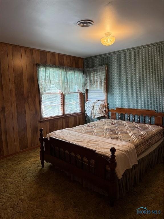 1110 Sandusky St, Fostoria, OH 44830 - bedroom with wooden walls