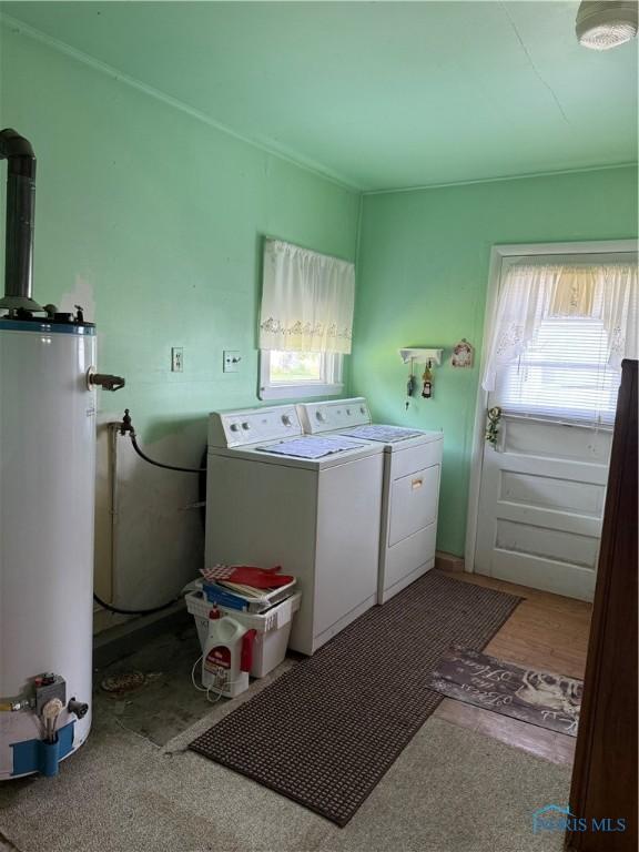 1110 Sandusky St, Fostoria, OH 44830 - laundry area featuring water heater and washer and dryer